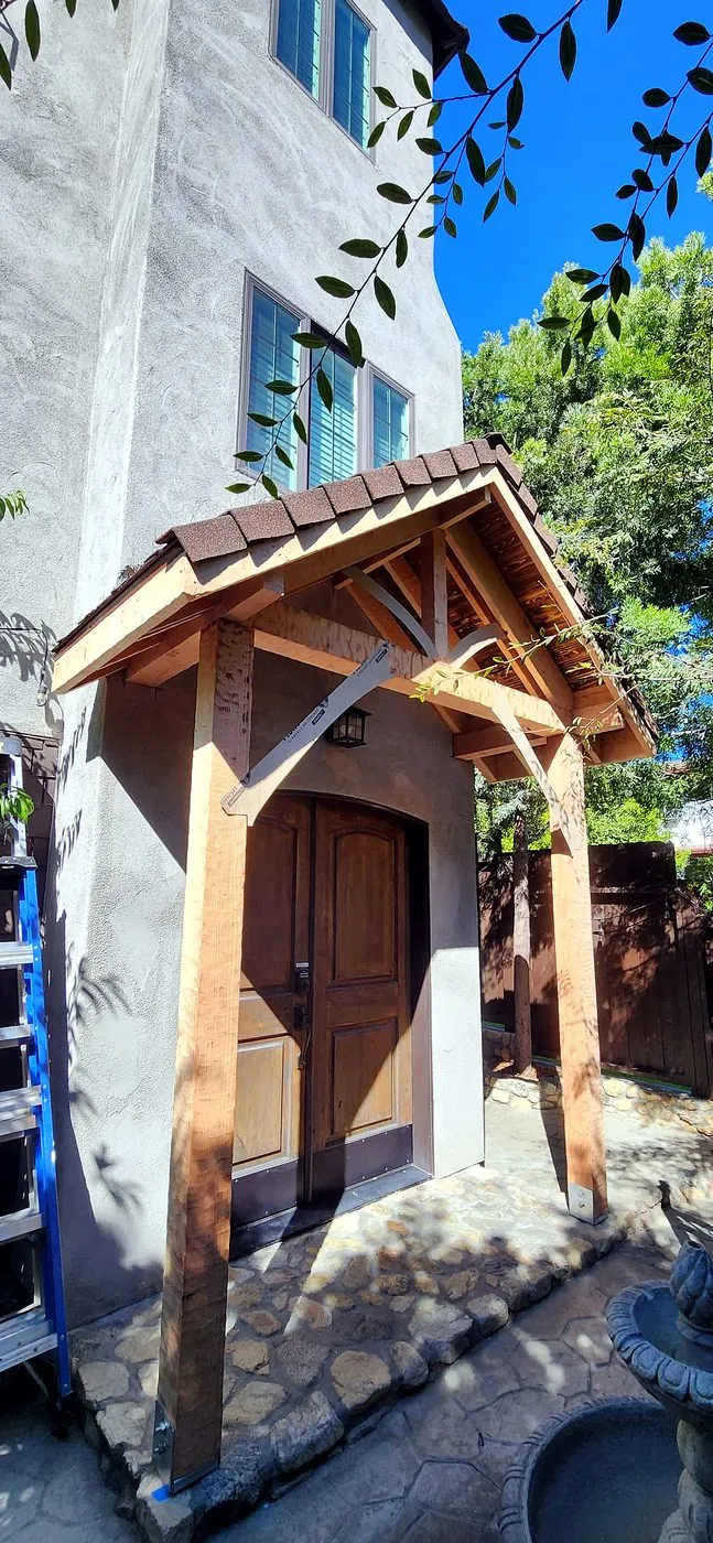 Before: raw timber portico framing