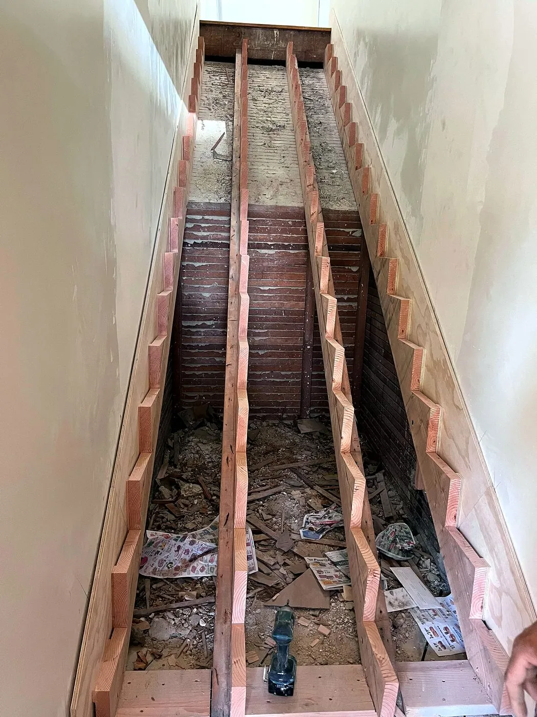 Before: staircase stringers during framing