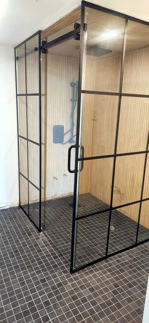 Black grid glass shower enclosure