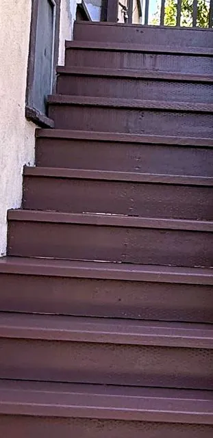 Freshly painted brown exterior stairs